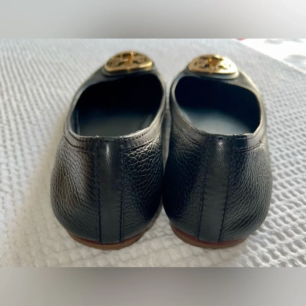 Tory Burch Black Flats with Gold Emblem